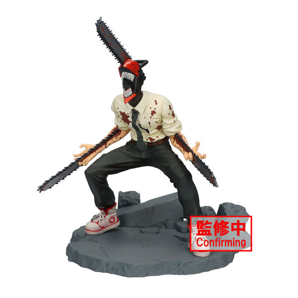 The Bandai Chainsaw Man Vibration Stars - Chainsaw Man Special figurine features a character with a chainsaw head and chainsaws extending from both arms. It is dynamically posed, dressed in a white shirt, black pants, and red shoes, and stands on a rocky base with a red stamped label that says "Confirming.