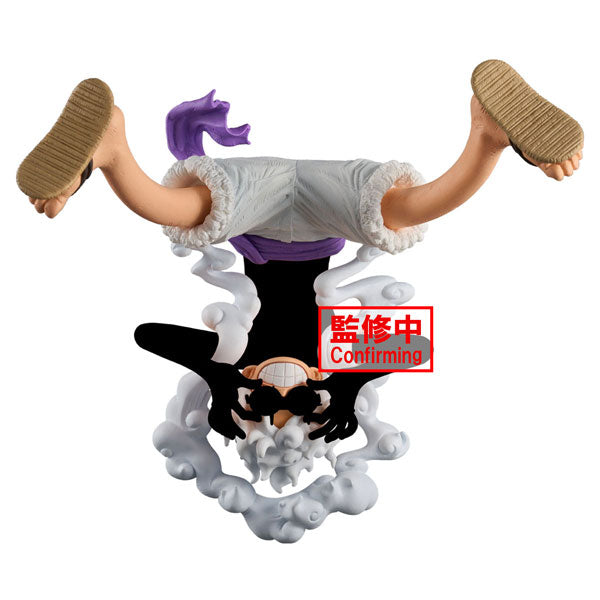 The product "One Piece King of Artist - The Monkey D. Luffy Gear5 II" by Bandai features a figurine of the character performing a handstand with legs elevated, adorned in sandals and white shorts. The figure is set against a backdrop of white clouds and is topped with a hat. A red label displaying foreign text reads "Confirming.